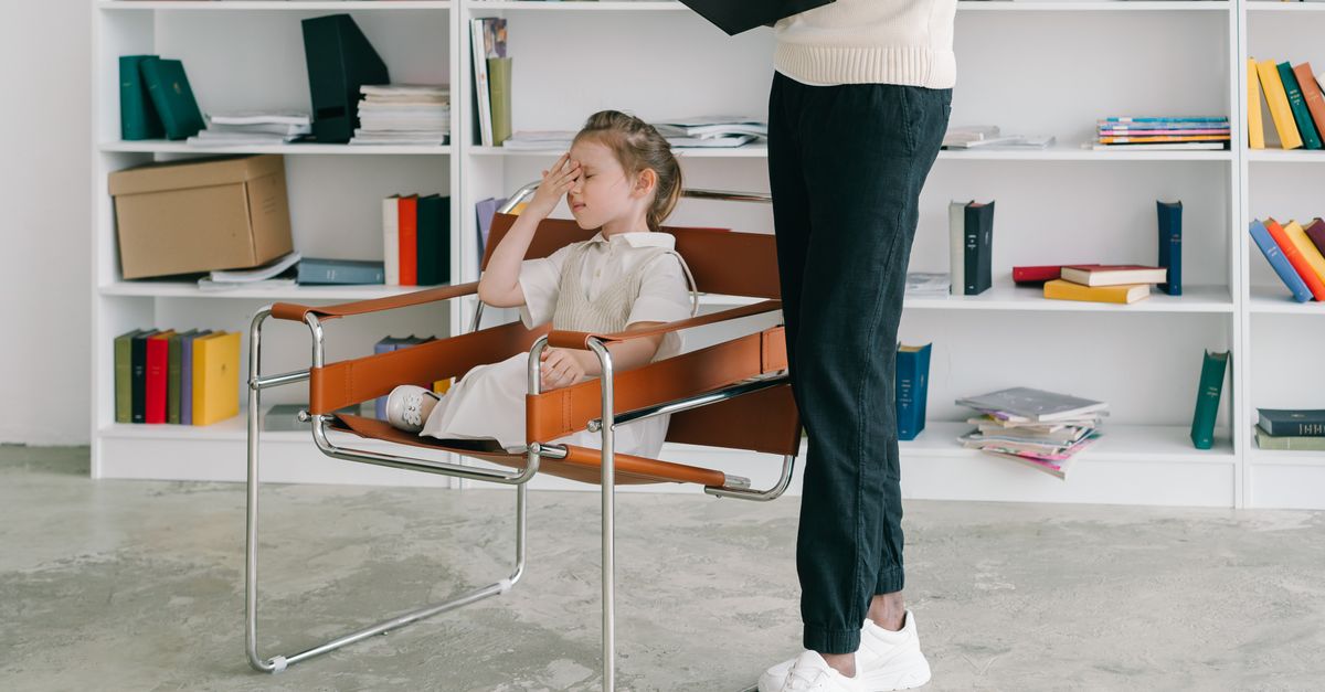 Child working with the therapist in a CBPT session for elimination disorders