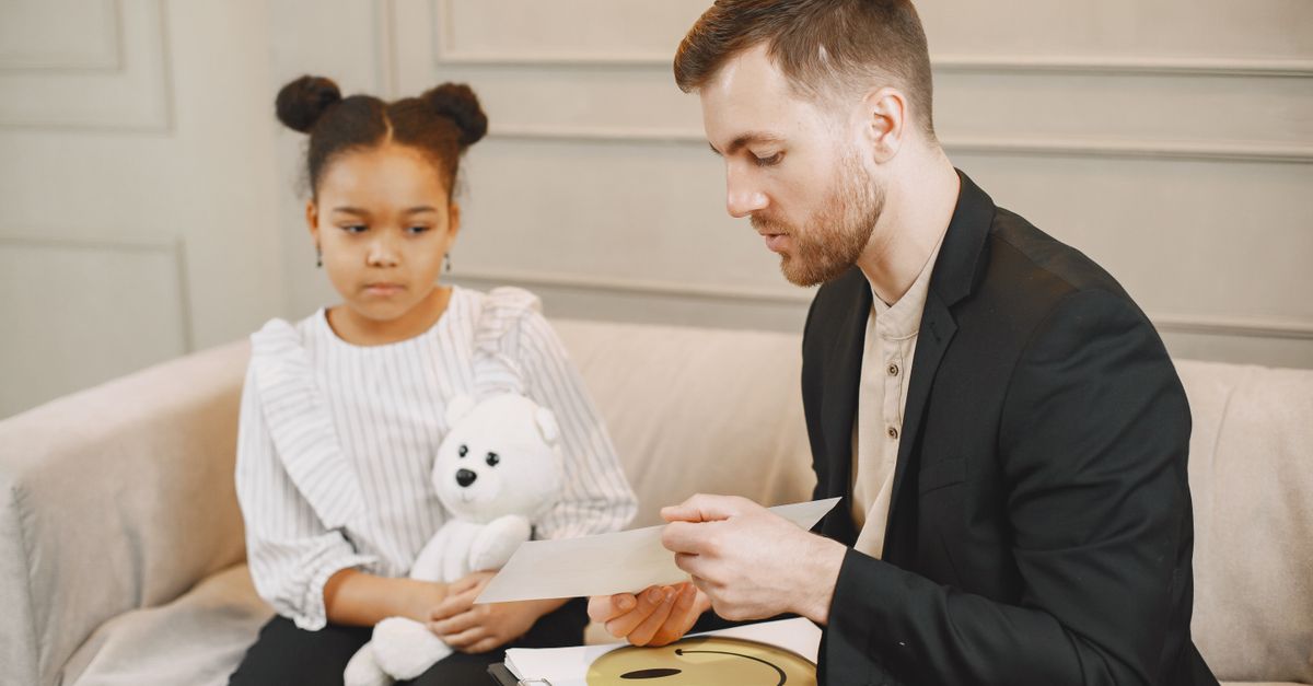Child working with the therapist in a CBPT session for generalized anxiety disorder