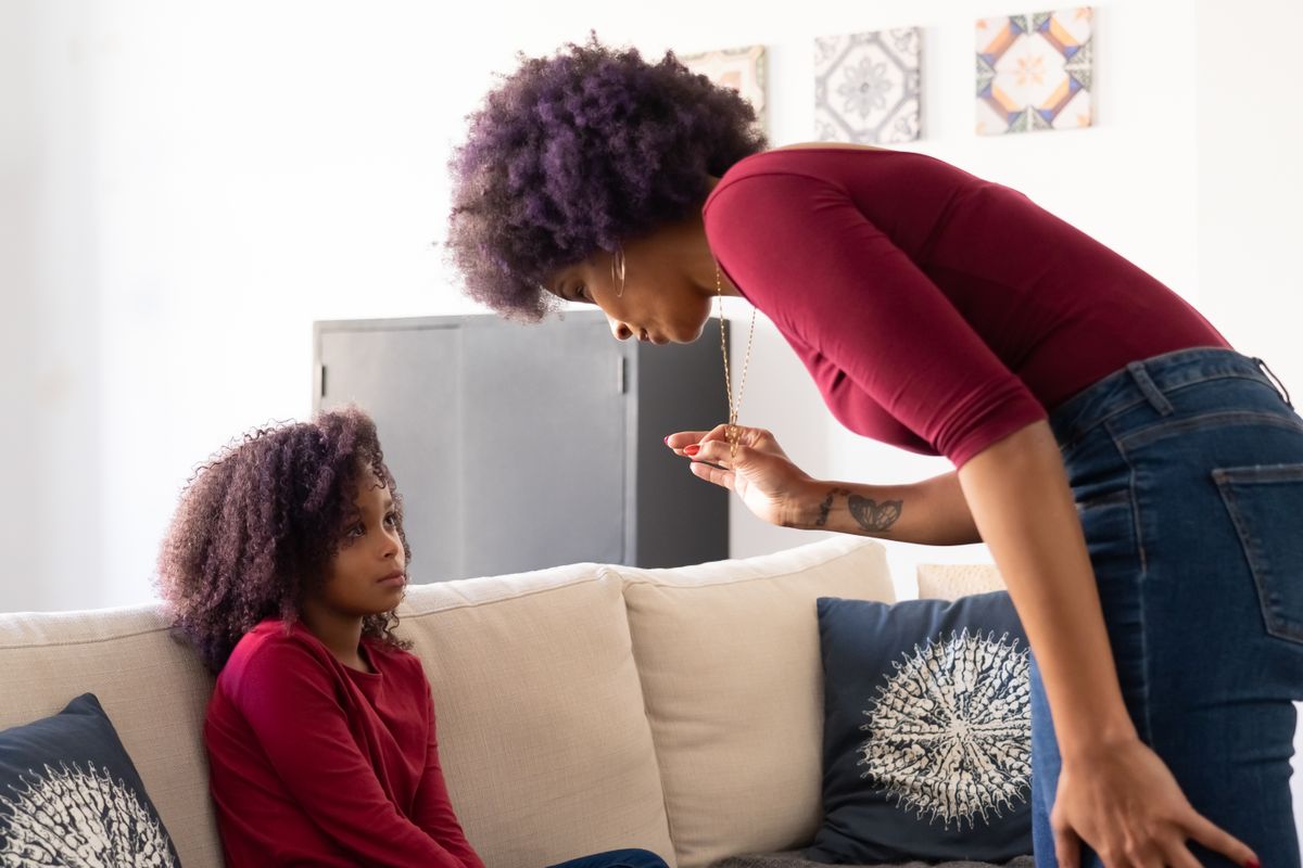 Parent supporting a child with separation anxiety through CBPT parent training