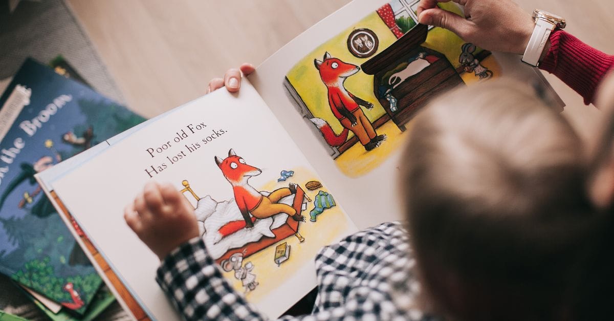 Therapist and child using storytelling in a CBPT session